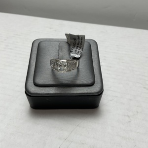  Platinum woman’s diamond ring.