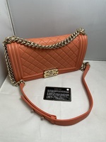 CHANEL Orange Lambskin boy flap bag