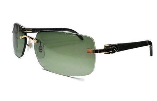 CARTIER Black Buffalo Horn Rimless Sunglasses with Green Tint