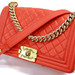 CHANEL Boy Red/Orange Quilted Lambskin Crossbody Bag w/ Gold HW - Very Good