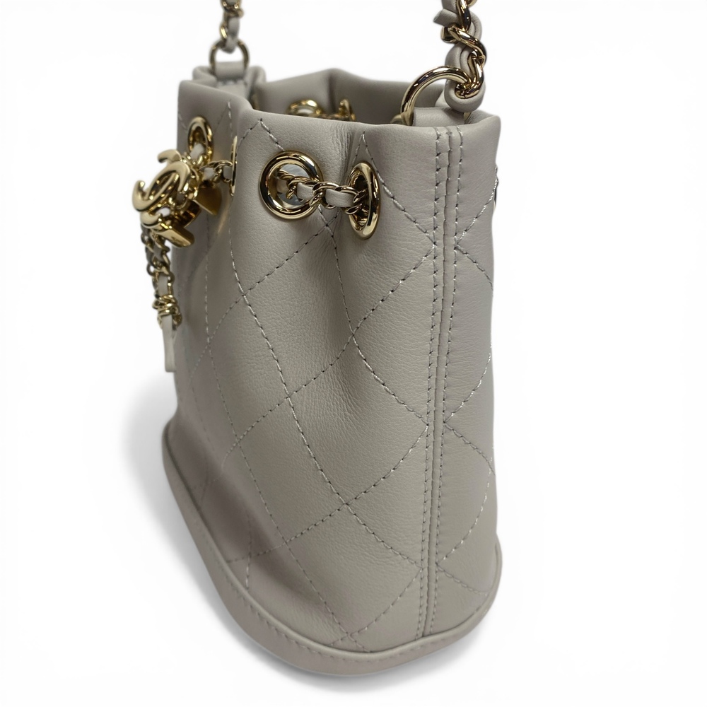 chain detail mini bucket backpack Leather Bag Open interior Black Safety Pin & Chain